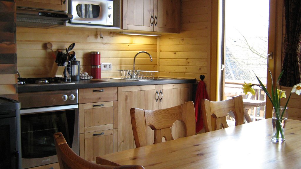 Kitchen/Diner with seating for 6 and door leading onto the terrace.